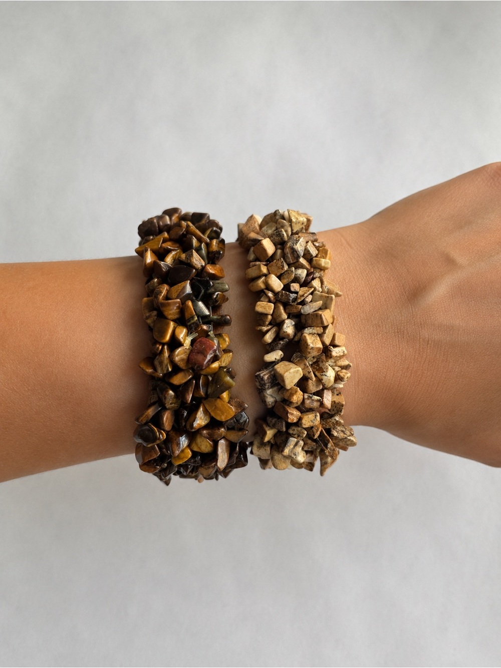 Two stretch bracelets. One made of Jasper chips and one of Tiger eye chips